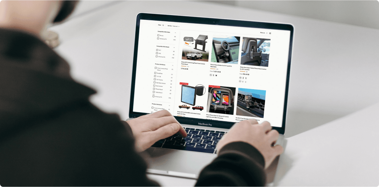 A customer browsing the EveryAmp product listing with filters on a laptop